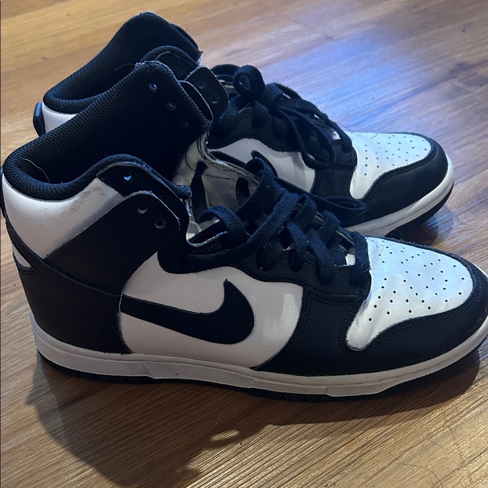 Nike women's Black and White dunk Hightops (size 7)